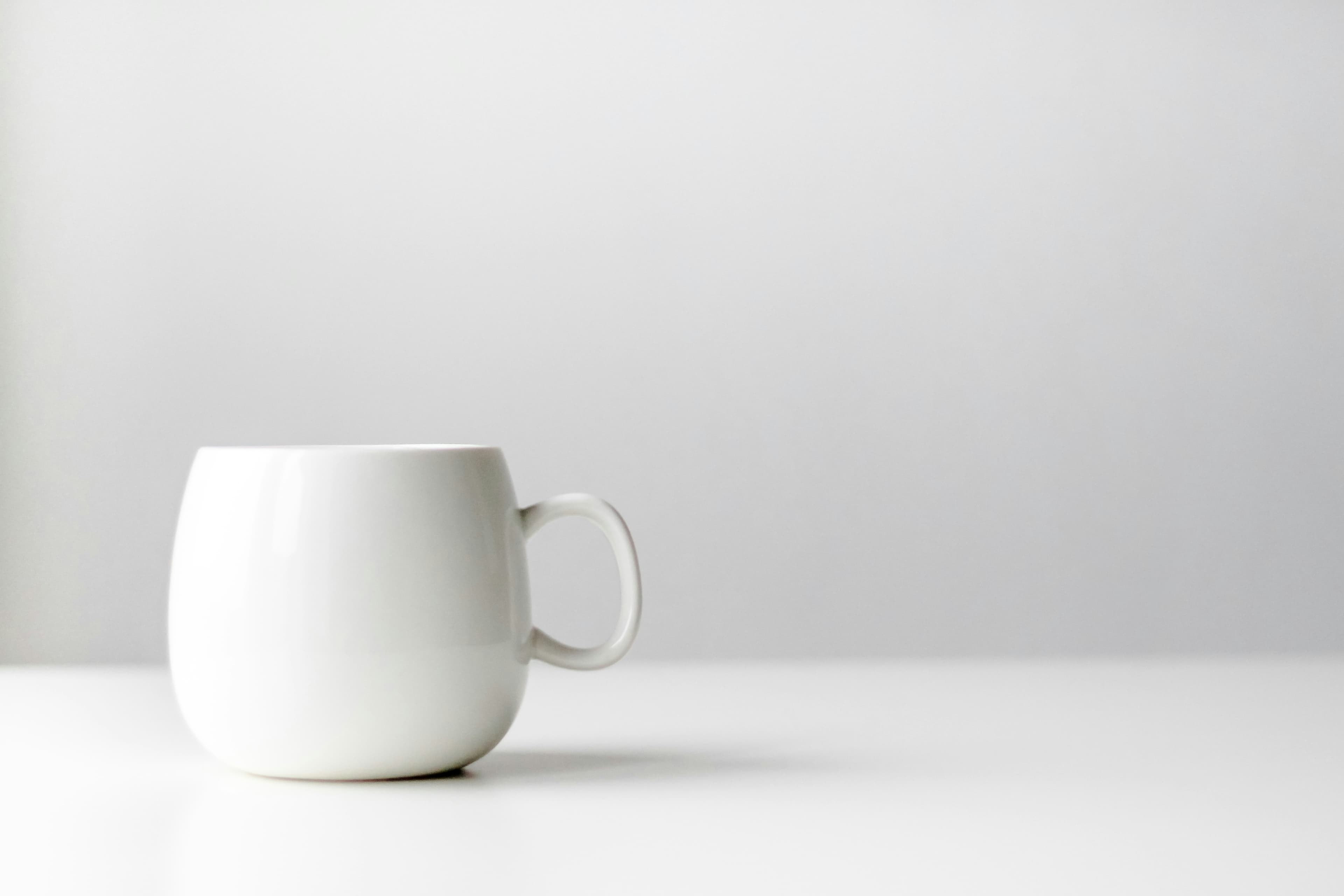 Minimal ceramic mug on a table